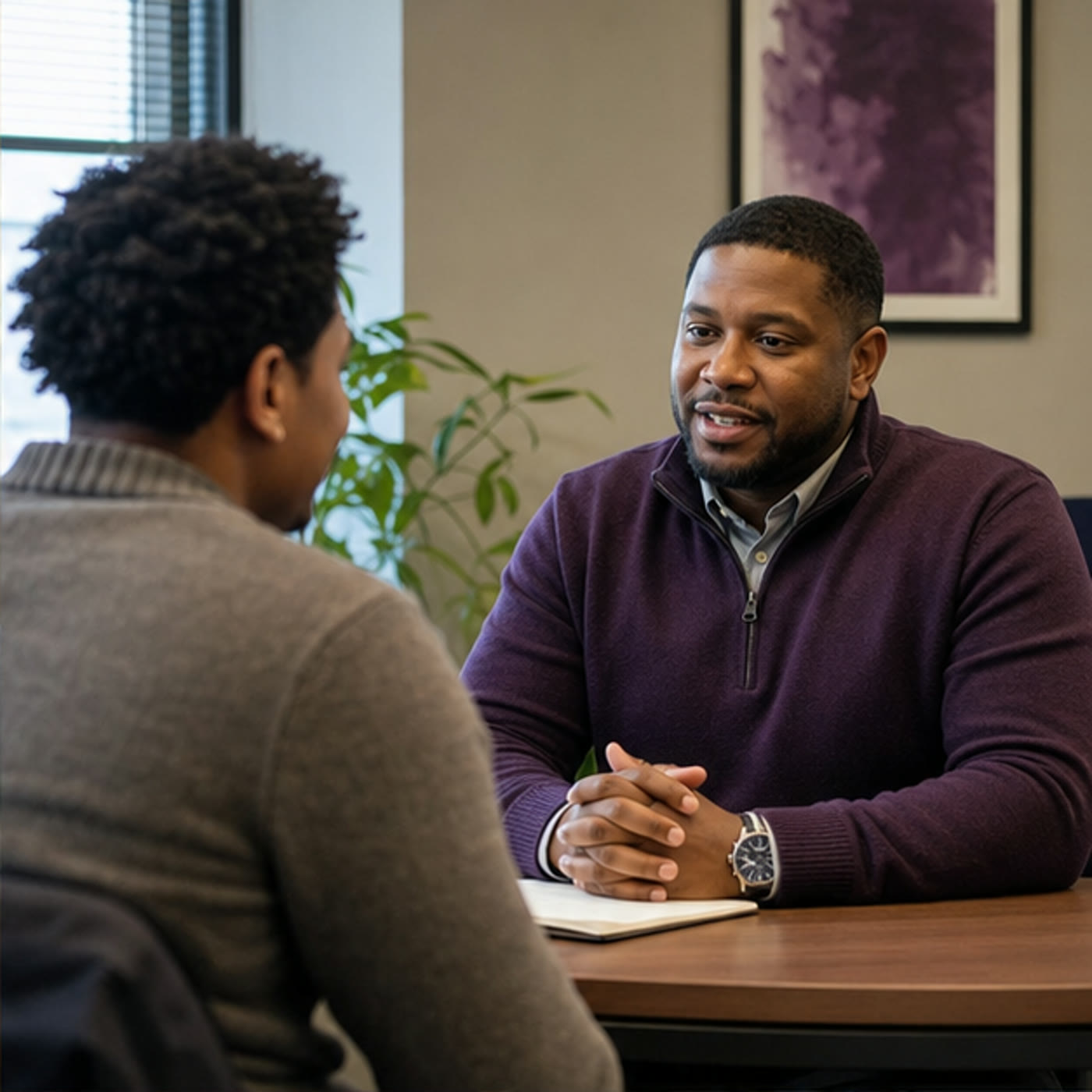 A job applicant meeting with an Impact Lives Cincinnati hiring manager