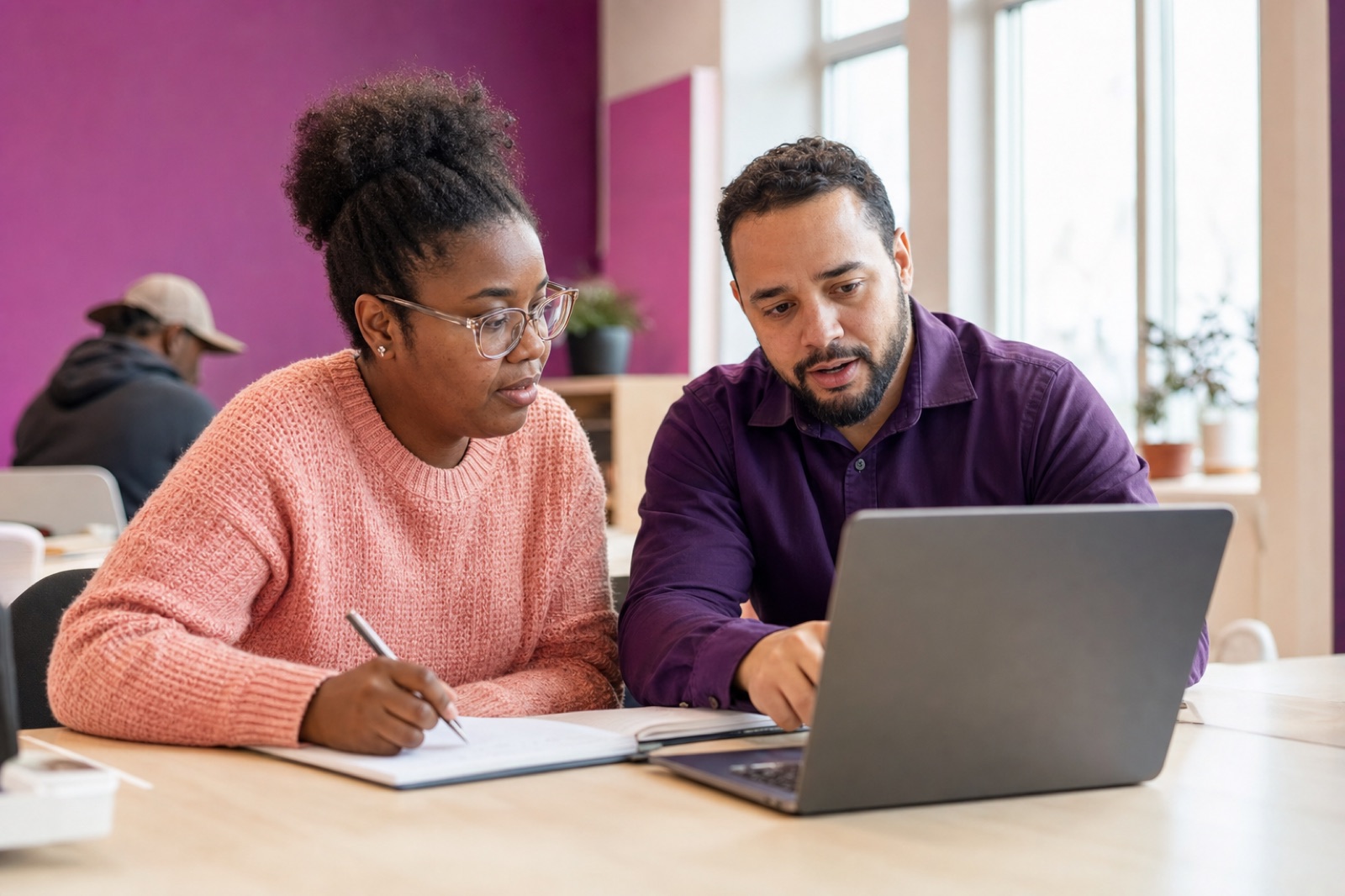 A vocational coach helping a participant plan workplace goals